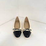 Stuart Weitzman - Women's Sleek Bow Flat Sandal