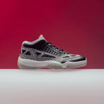 Air Jordan 11 Retro Low IE "Black Cement" - Black/Fire Red