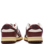 Women's Dunk Low SE Sisterhood Team Red - Sail/Team Red/Black/Muslin
